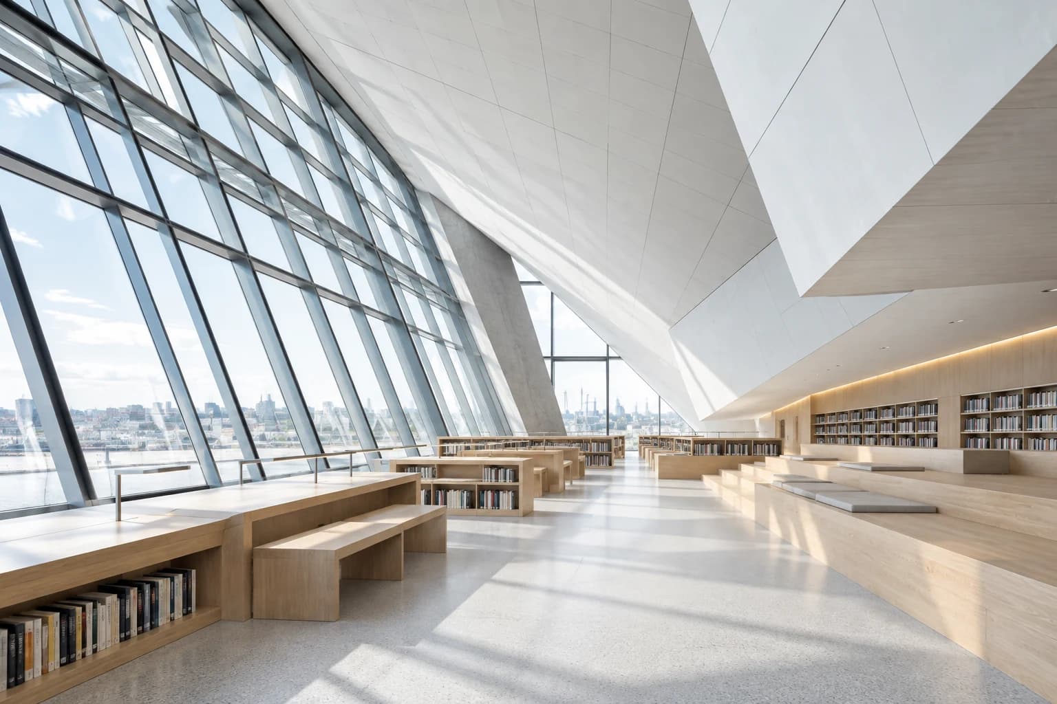 Angular daylight-filled reading room with oak benches